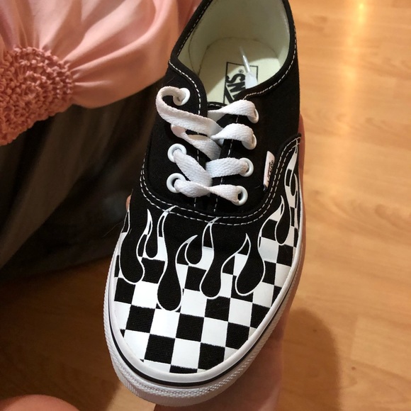 black vans with checkered flames